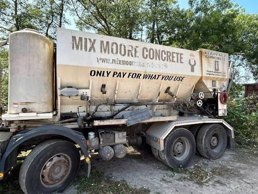 Non-running cement mixer truck waiting for removal in the Fraser Valley